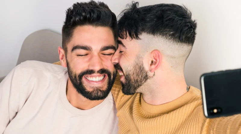 Two people connecting over a video call on Rynbw